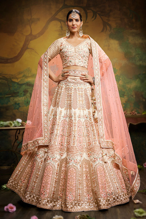 Adorned Bridal Silk Lehenga Choli In Cream Color 