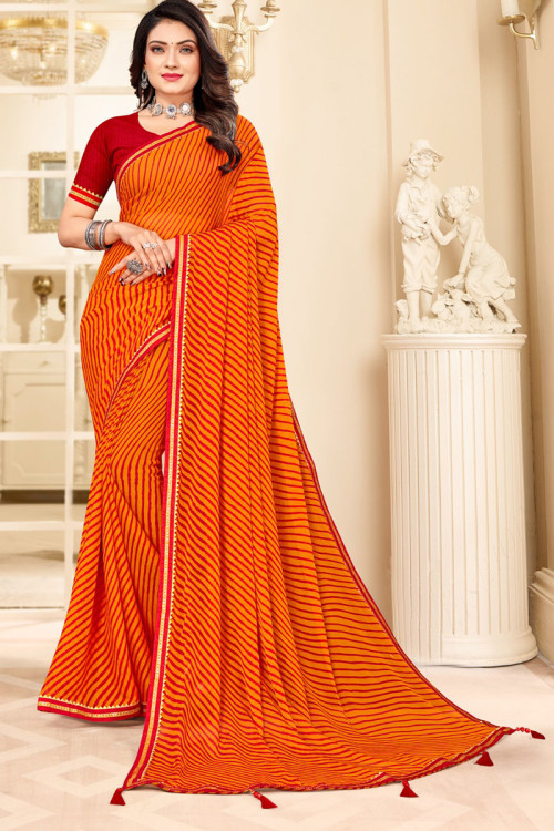 Saffron Yellow Cotton Saree With Leheriya Print – MySilkLove