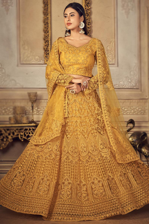 Alluring Light Yellow Lehenga Choli With Halter Neck Blouse – Palkhi Fashion
