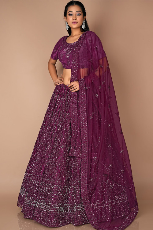 Photo of Purple lehenga for engagement with bride twirling