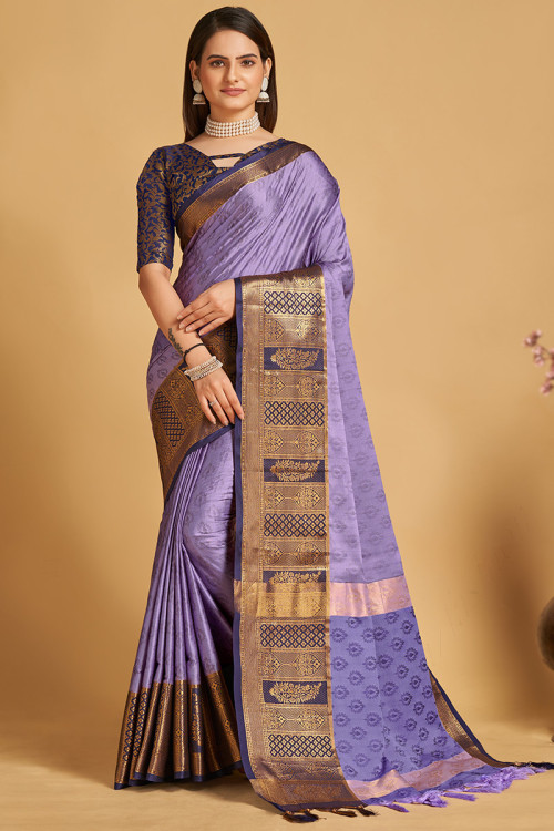 Lavender color fancy silk saree with golden zari weaving work