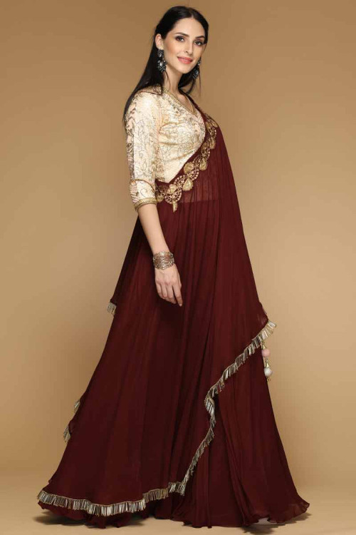 maroon lehenga with golden choli