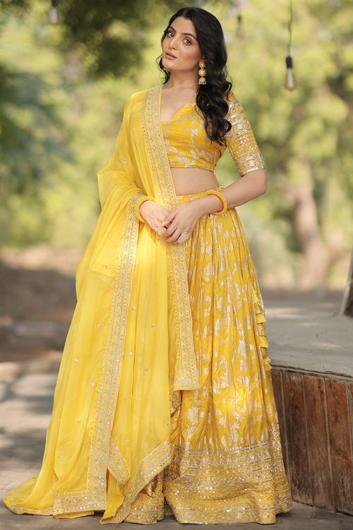 Mustard Yellow Silk Weaved Zari Flared Style Lehenga For Haldi