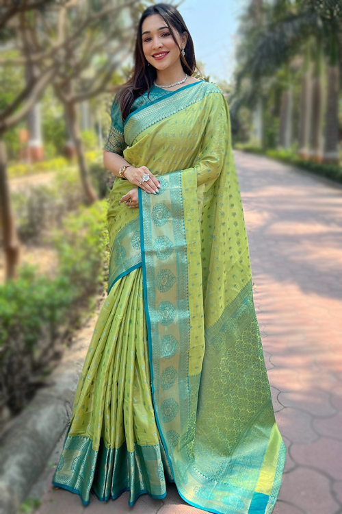 Pistachio Green Silk Saree with Woven Zari Broad Border Design