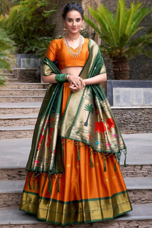 Rust Orange Silk Blend Weaved Zari Lehenga For Festival