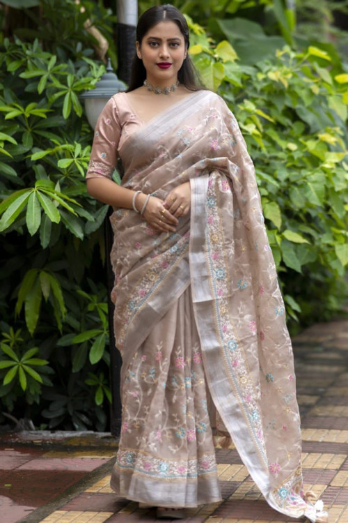 Purple digital printed linen saree accentuated with colourful floral  designs on its body,self-pallu of stripes & tassels