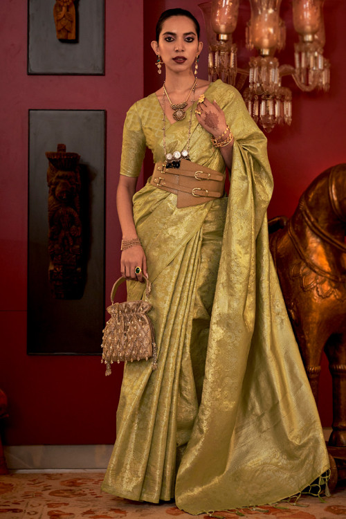 DUSTY BLOWN PALAZZO PANT SAREE SET WITH A MULTI COLOURED EMBROIDERED BLOUSE  AND DRAPED PALLU WITH MATCHING COLOURED BROACHES. - Seasons India