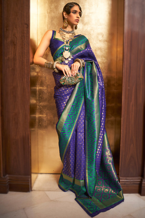 Premium AI Image | The Allure of Deep Purple A Radiant Woman in a Stunning  Saree with Intricate Detailing Showcased