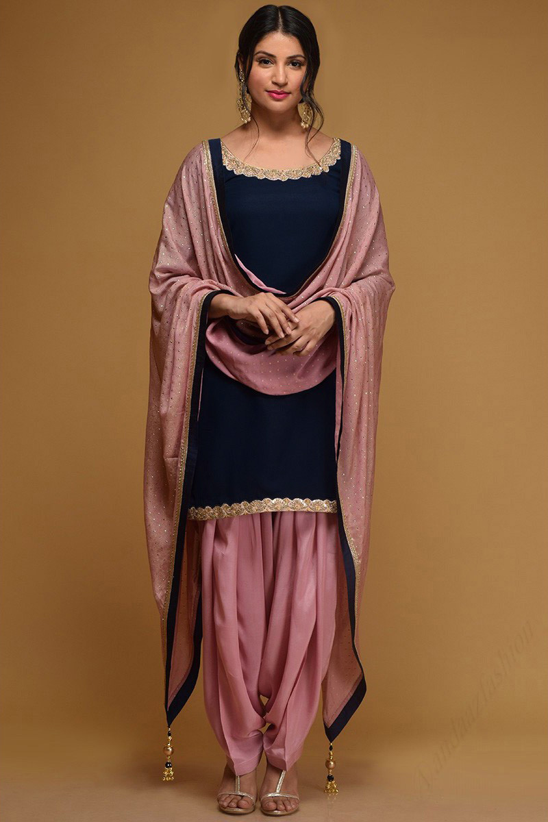 net-silk-fabric-punjabi-women-patiala-salwar-suit-in-orang… | Flickr