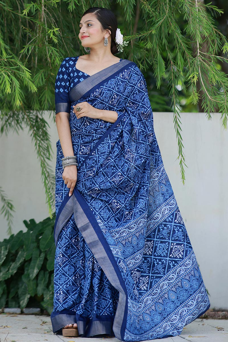 Grey warli-style village printed art silk saree with warli figurines,  contrast warli motifs border & intricate pallu