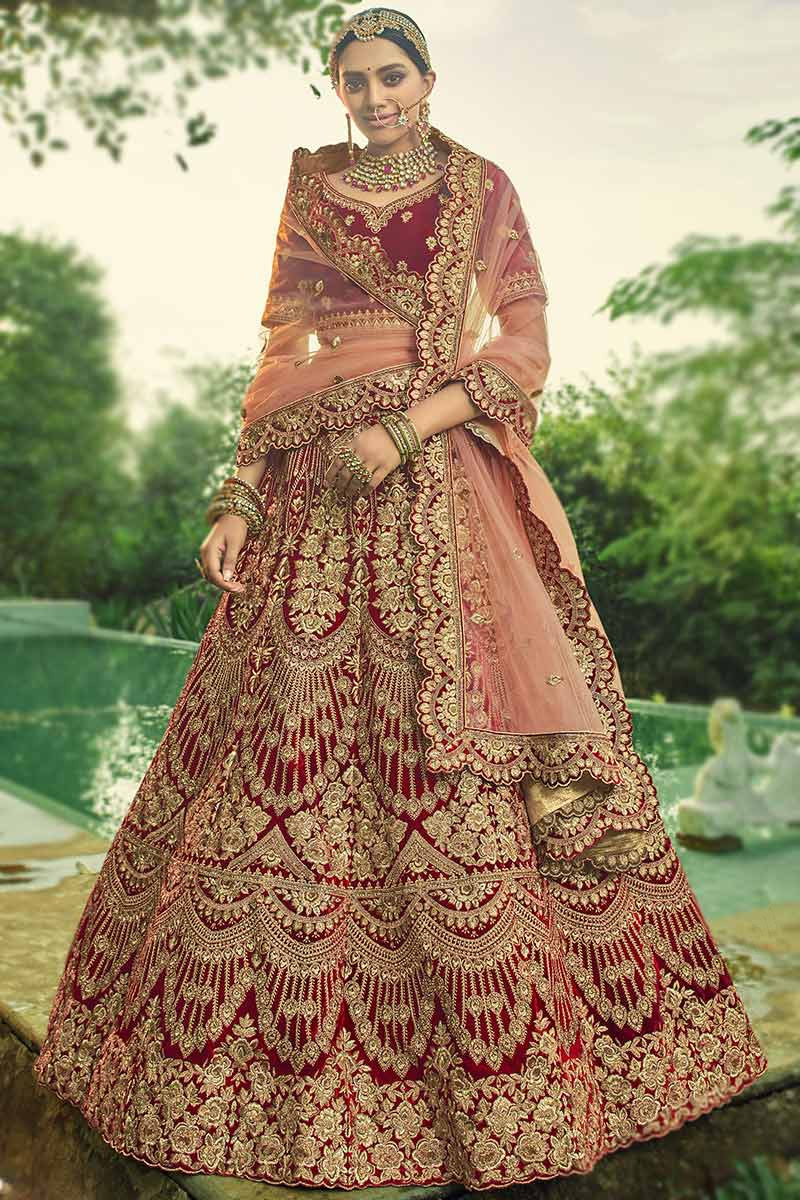 Kajal Aggarwal's red Anamika Khanna bridal lehenga featured stunning  Kashmiri resham work | VOGUE India