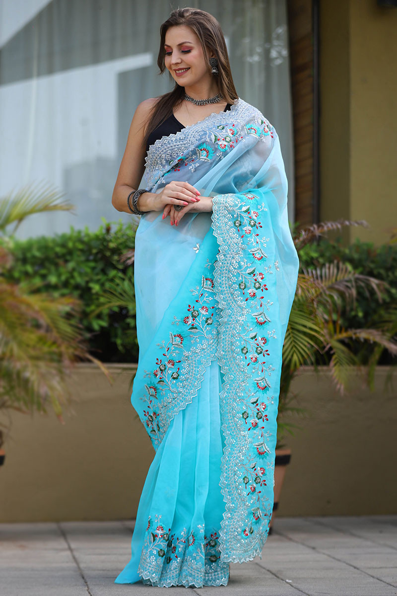 Buy online Women's Self Design Light Blue Colored Saree With Blouse from  ethnic wear for Women by Charukriti for ₹2989 at 40% off | 2024 Limeroad.com