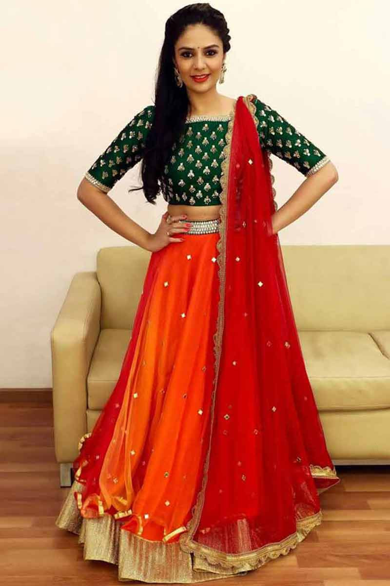 Orange and green lehenga choli discount