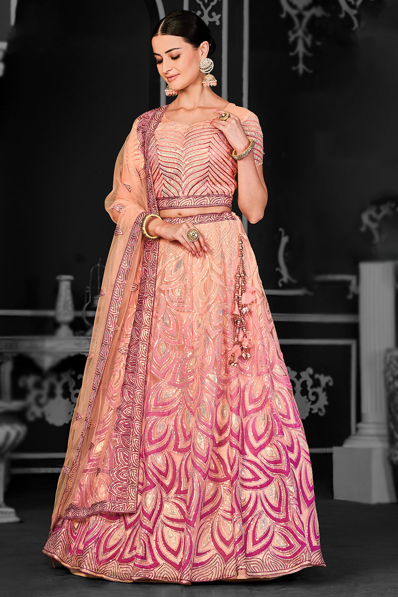 Net Peach Embroidered Flared Lehenga