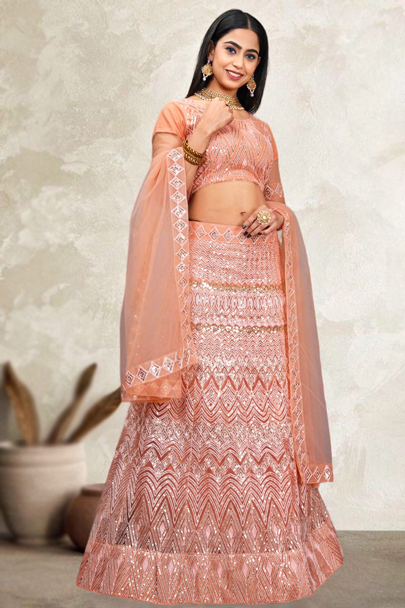 Peach Net Sequins Embroidered Panelled Style Lehenga 