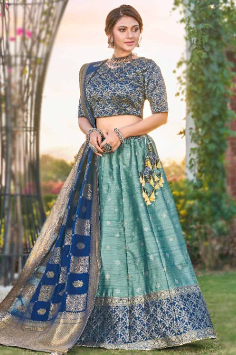 Enticing Peach Color Art Silk Fabric Lehenga With Embroidered Work
