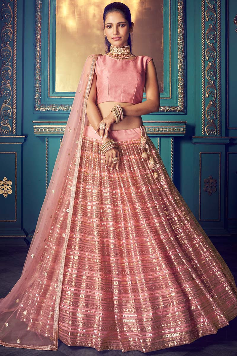 soft net wedding wear lehenga choli in rose pink color llcv01992