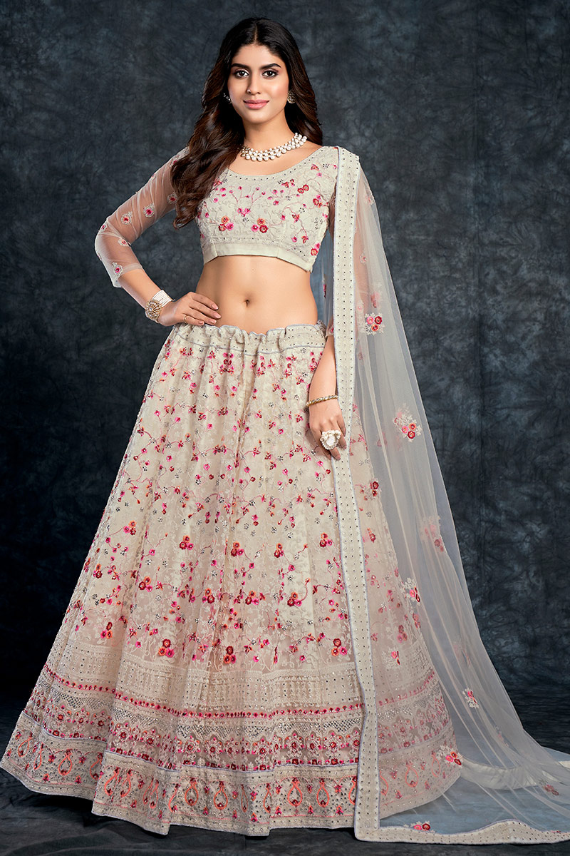 Stone Work Embroidered Net Creamy Pink Lehenga
