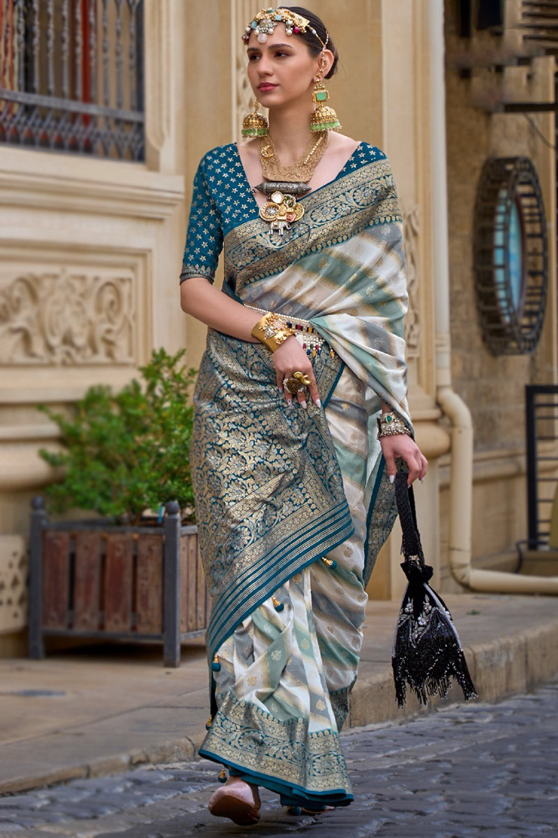 Off white saree with blue deals border