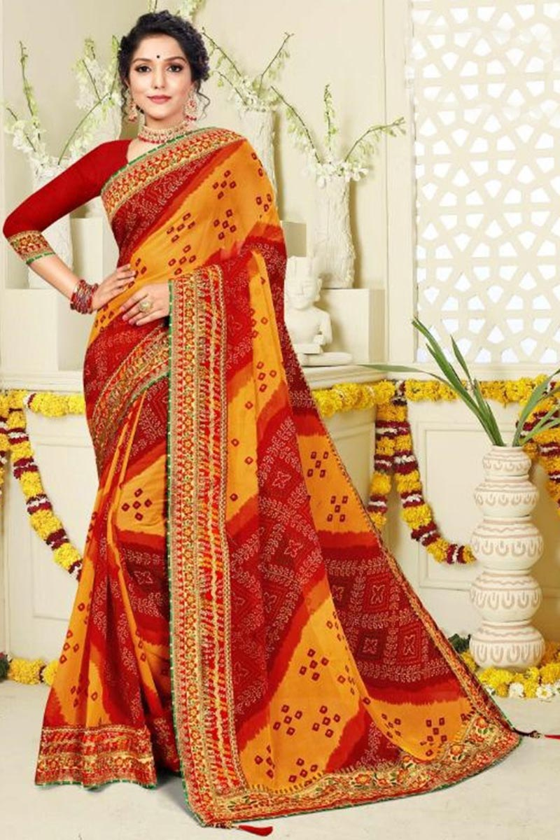 Turmeric Yellow And Red Georgette Printed Saree