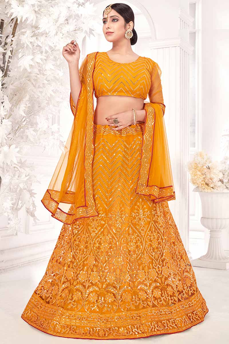 Turmeric Yellow Net Embroidered Party Wear Lehenga