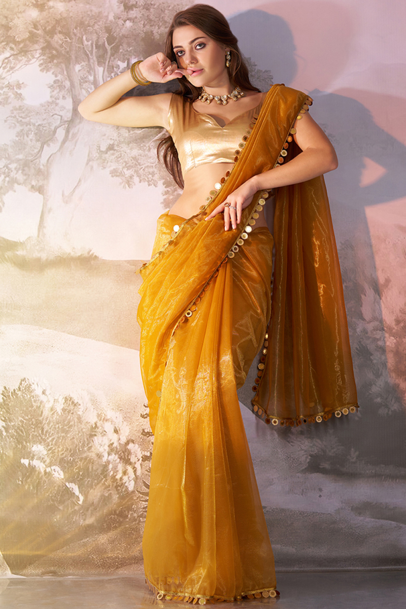 Turmeric Yellow Net Embroidered Shimmer Saree