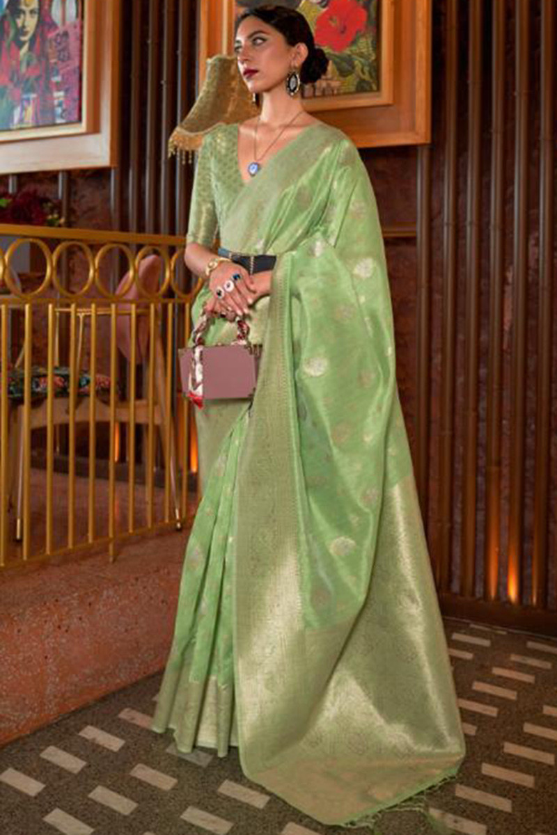 Mehendi Green and Dark Green color silk sarees with allover bandez print  and cut broaso border