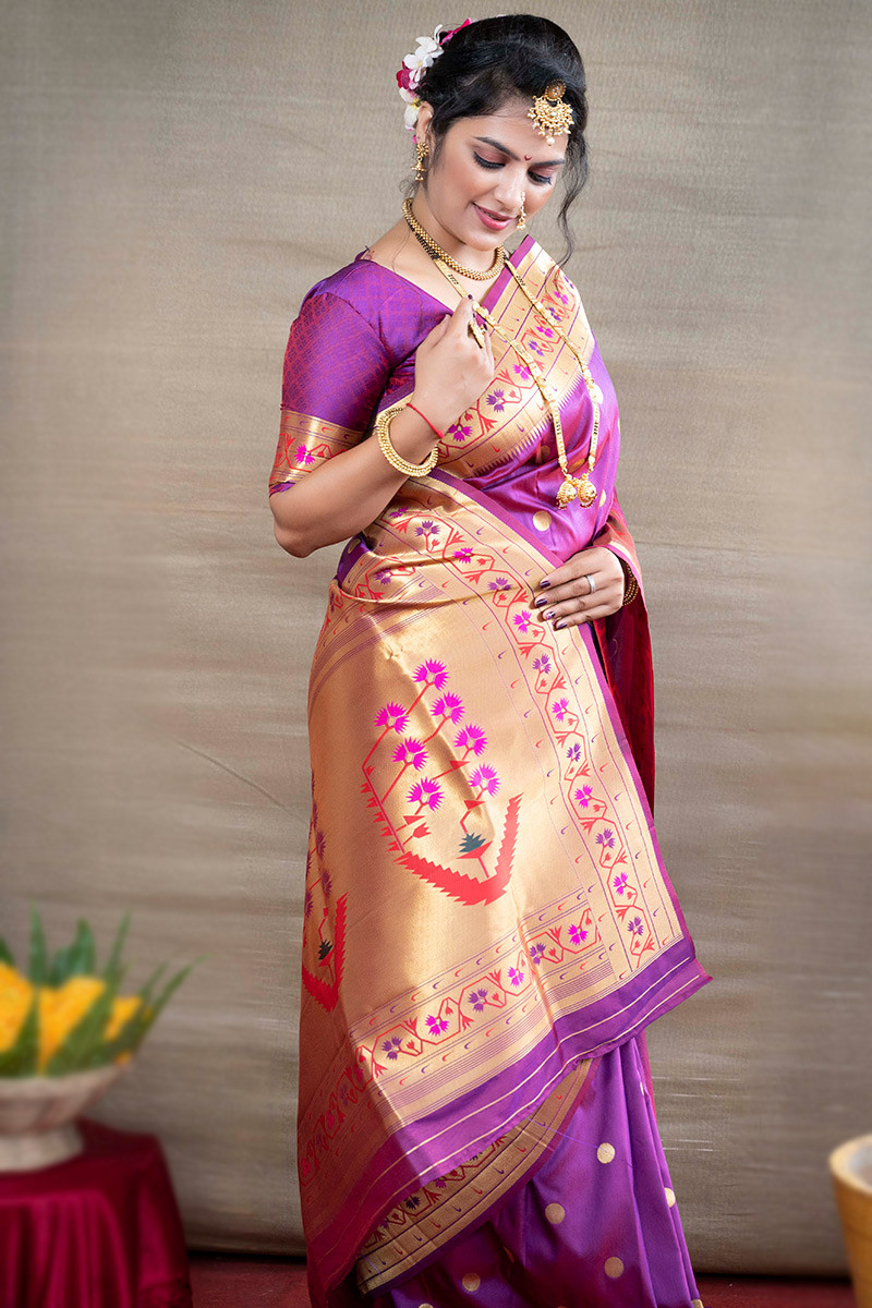 Pink and violet color hand bandhej silk saree with zari weaving work