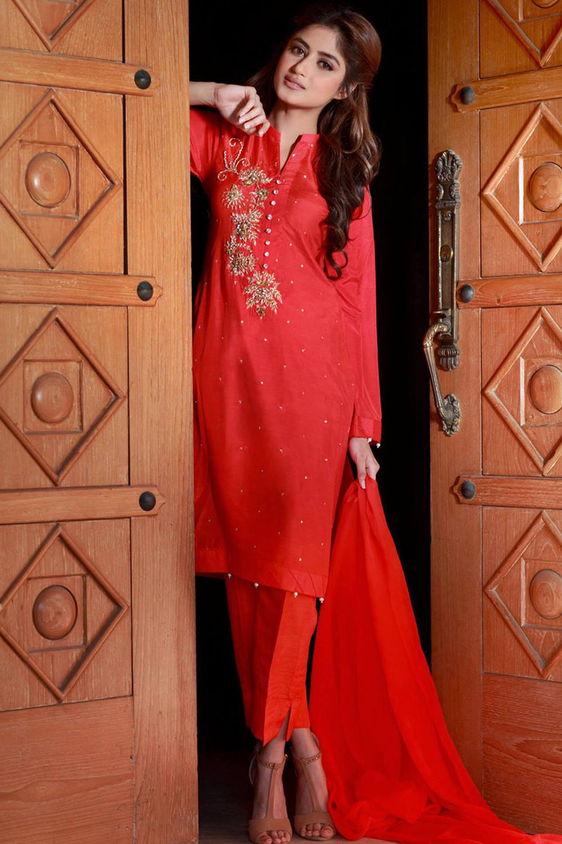 red trouser suit