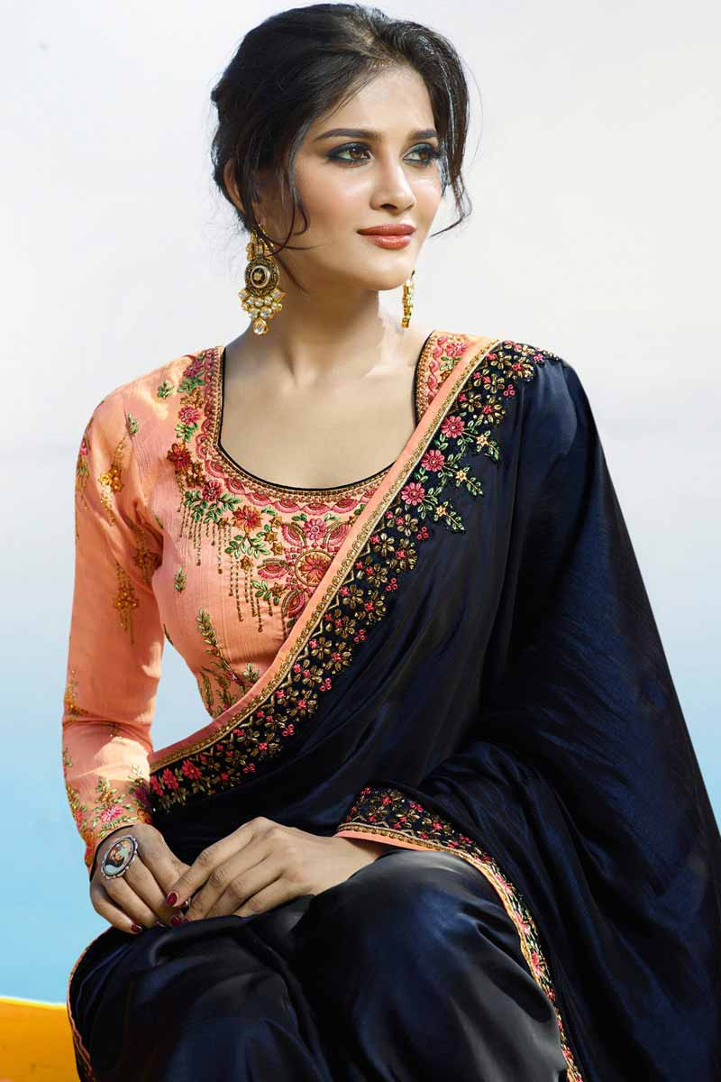 peach and navy blue saree