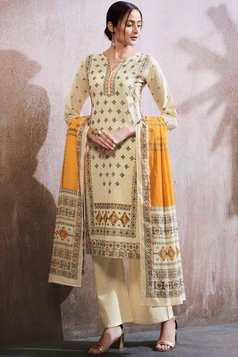 cream trouser suit for a wedding
