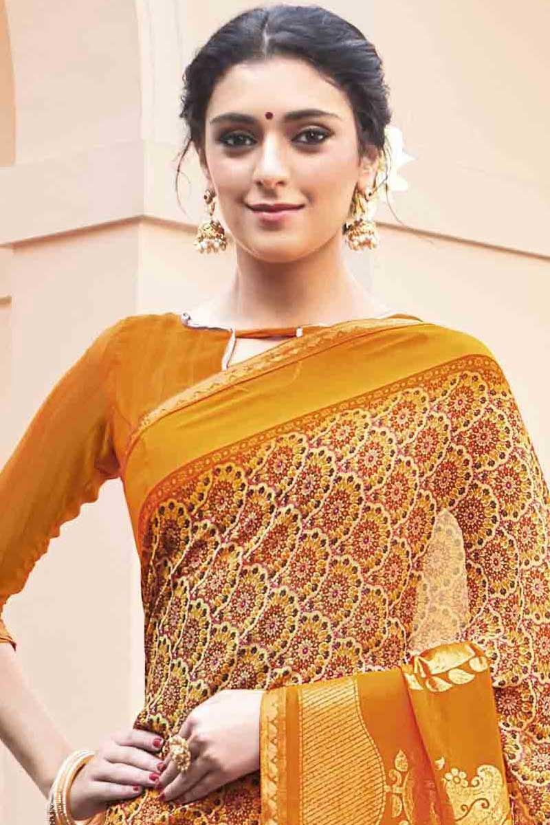 Women's Georgette Orange Embellished Designer Saree With Blouse Piece