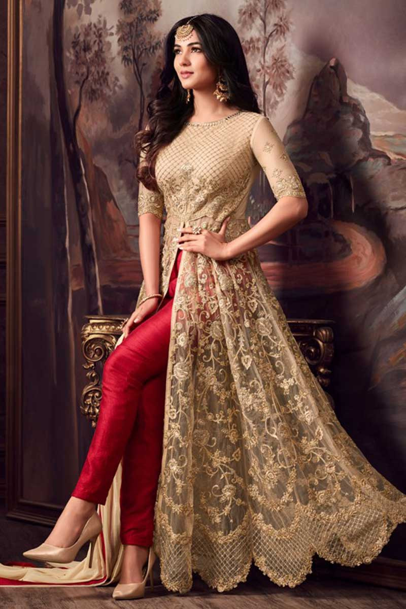 golden gown with red dupatta