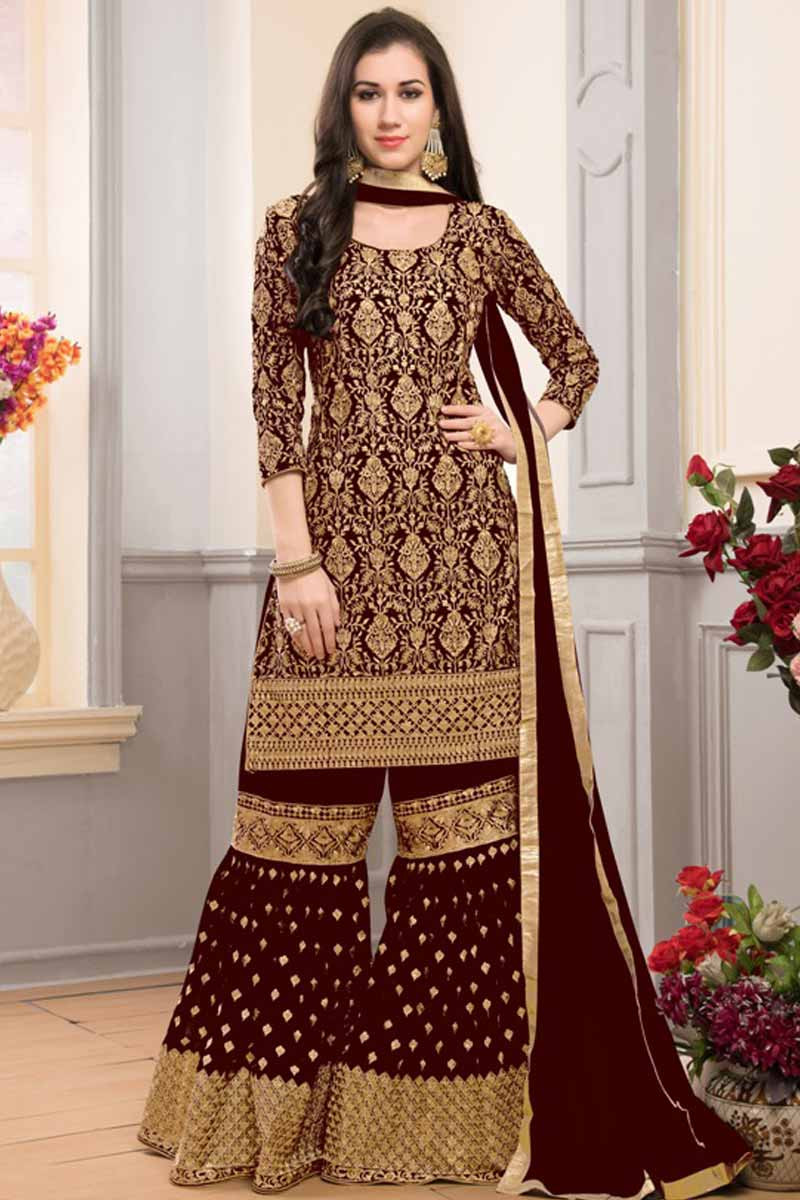 Lovely Faux Georgette Sharara Suit In Burgundy Wine Color