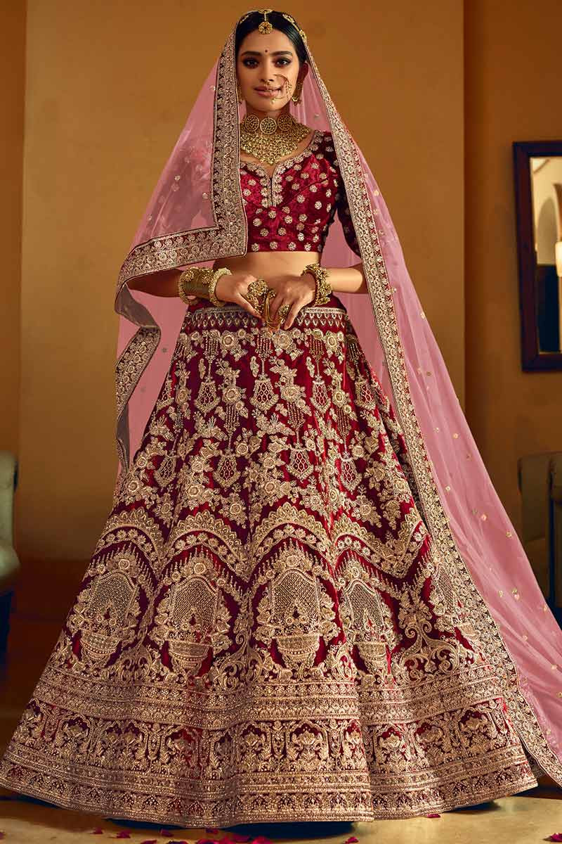 Photo of A bride in maroon lehenga and double dupatta twirling | Latest  bridal lehenga designs, Indian bridal dress, Indian bride outfits