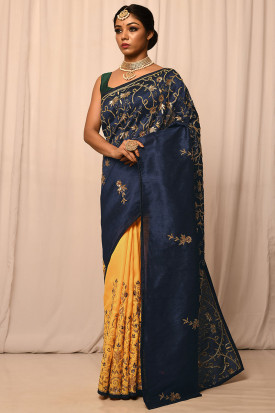 Yellow saree with navy blue blouse top