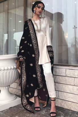 Designer salwar kameez in white colour top