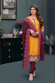 Dazzling Fire Yellow Crepe Churidar Suit With Resham Work