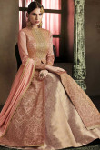 Dazzling Silk Anarkali Suit In Rust Color With Resham Embroidered