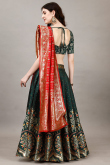 Art Silk Bottle Green Woven Zari Panelled Style Lehenga