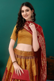 Art Silk Mustard Yellow Woven Zari Panelled Style Lehenga