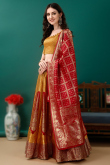 Art Silk Mustard Yellow Woven Zari Panelled Style Lehenga