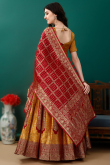 Art Silk Mustard Yellow Woven Zari Panelled Style Lehenga
