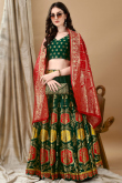 Art Silk Woven Zari Bottle Green Panelled Style Lehenga