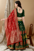 Art Silk Woven Zari Bottle Green Panelled Style Lehenga