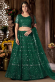 Party Wear Sequins Embroidered Bottle Green Lehenga in Net