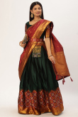 Bottle Green Silk Woven Zari Flared Lehenga