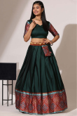 Bottle Green Weaved Zari Casual Wear Flared Style Silk Lehenga