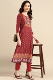 Kurti for Party Wear in Poly Crepe Brick Red with Printed