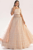 Butterfly Net Scalloped-Eged Lehenga In Peach 